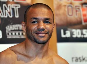 Leonard Bundu from Italy smiles at the w