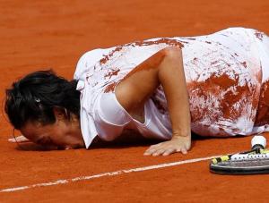 Francesca Schiavone of Italy celebrates winning her women's final against Samantha Stosur of Australia at the French Open tennis tournament at Roland Garros, in Paris