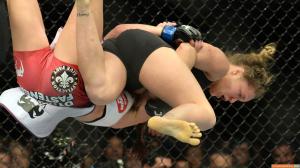 Ronda-Rousey-flying-yellow-feet