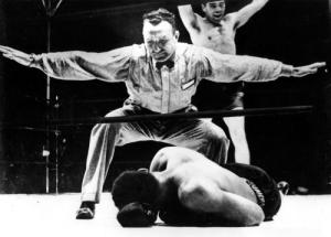 ** FILE ** Joe Louis lies on the canvas after being knocked out by Max Schmeling, rear, in this file picture taken June 19, 1936 in New York.  Schmeling has died Wednesday Feb. 2, 2005 aged 99, the Max Schmeling Foundation announced Friday Feb. 4, 2005. (AP Photo)