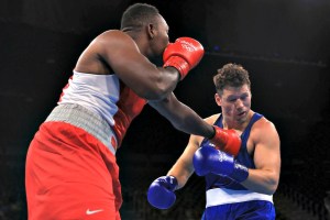 U.S.-Virgin-Islandss-Clayton-Laurent-Jr.-lands-a-punch-against-Erik-Pfeifer-of-Germany-in-the-men’s-super-heavyweight-boxing-at-the-Riocentro-on-Tuesday-August-9-2016