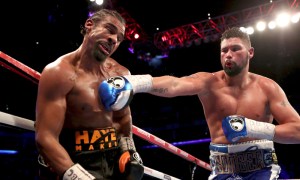 Britain's Tony Bellew, right, sends a right to his countryman David Haye during their heavyweight contest at the O2 Arena in London Saturday, March 4, 2017. Bellew knocked out Haye in the 11th round. (Nick Potts/PA via AP) ORG XMIT: TKTT805